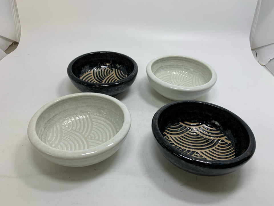 4 BLACK & WHITE BERRY BOWLS W/ DETAILED LINED BOTTOMS.