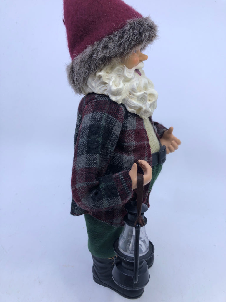 RESIN SANTA W/ PLAID FLANNEL HOLDING LANTERN.
