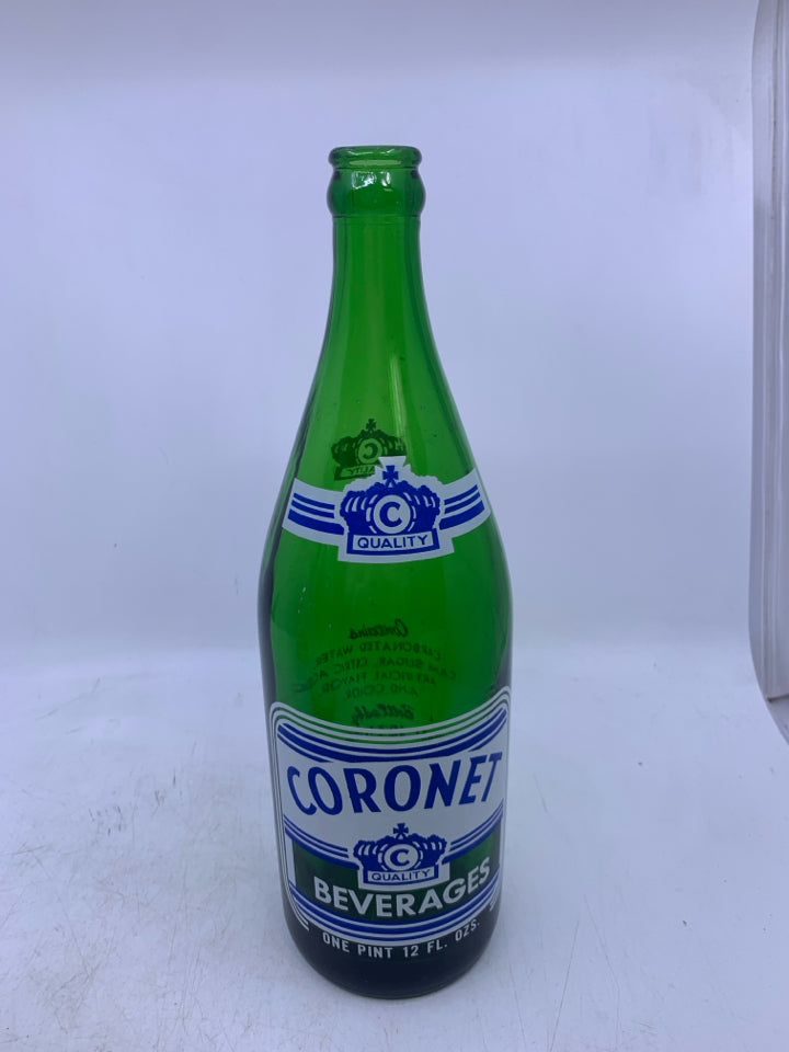 EMPTY GREEN CORONET BEVERAGES BOTTLE.