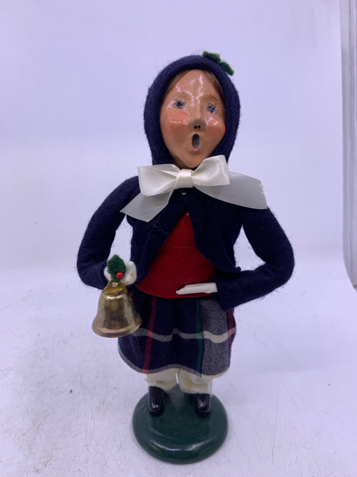 GIRL CAROLER W/ DARK BLUE COAT HOLDING BELL 1988 BYERS' CHOICE.