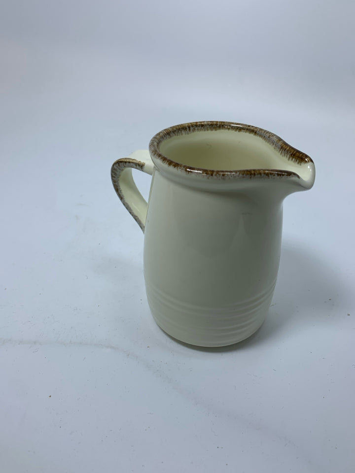 VTG RIBBED CREAMER W/ BROWN EDGE.