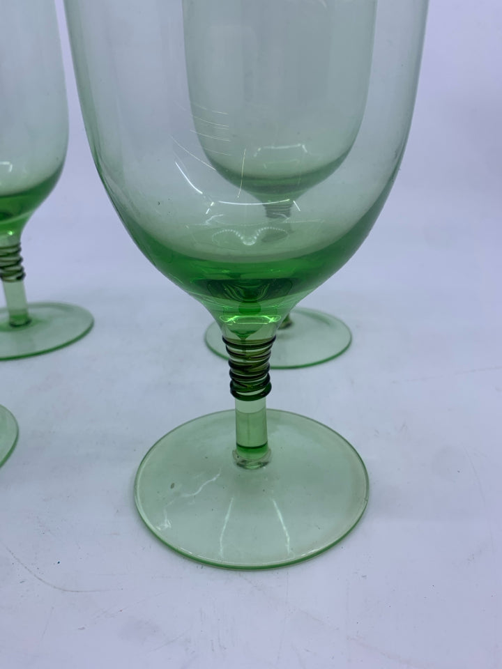 4 GREEN GLASS GOBLETS.