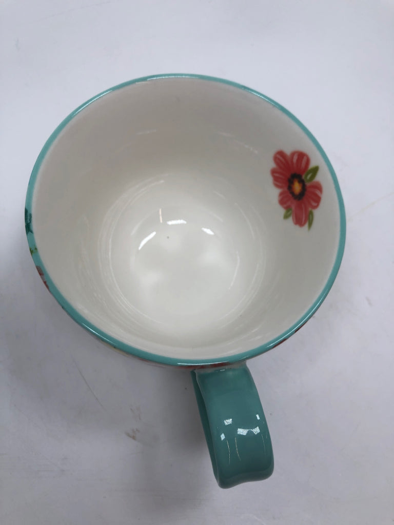 TEAL FLORAL FOOTED MUG.