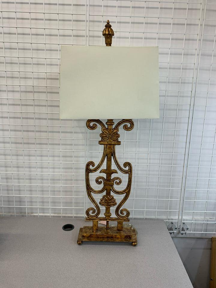 GOLD SCROLL METAL BASE LAMP W/SQUARE WHITE SHADE.