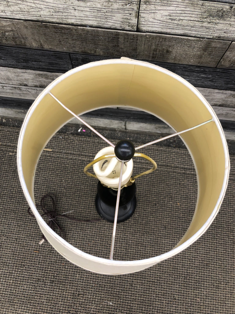 BROWN METAL BASE LAMP W/TAN SHADE.