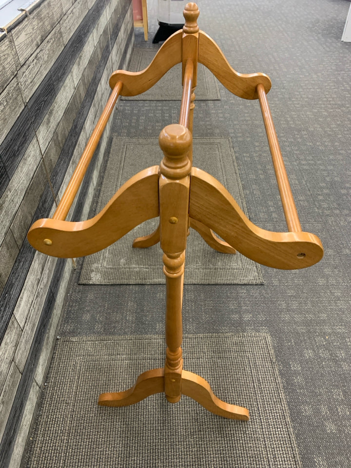 LIGHT WOOD BLANKET RACK.
