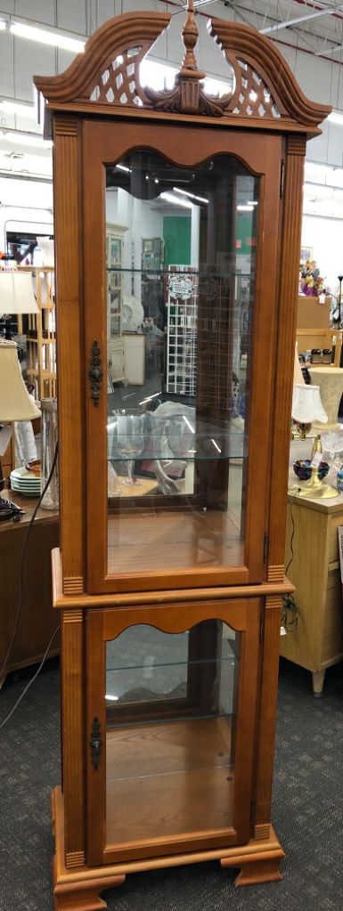 CURIO CABINET W/LIGHTS & GLASS SHELVES.