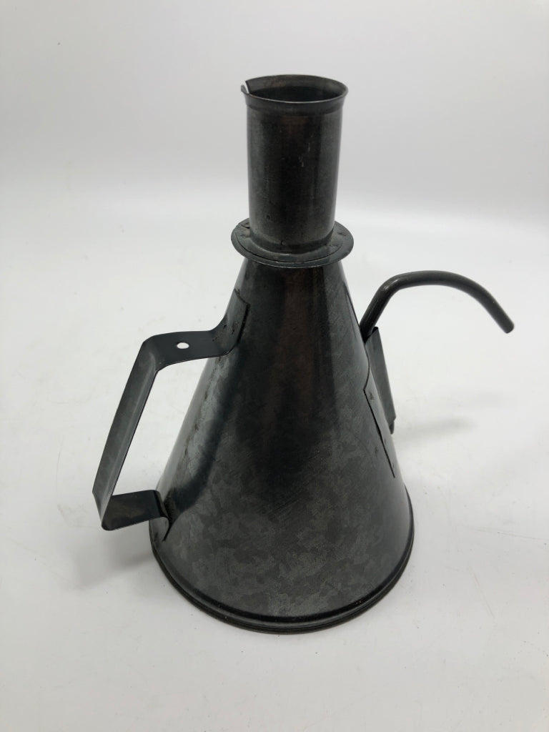 METAL OIL CAN CANDLE STICK HOLDER.
