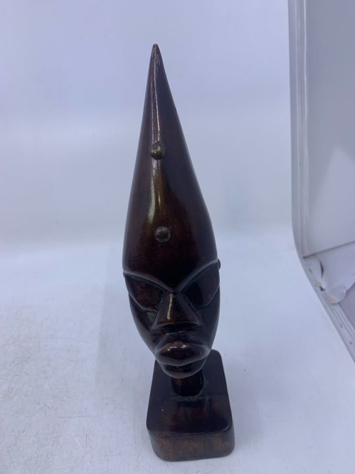 DARK GLOSSY CARVED WOOD POINTED HEAD FOLK ART.