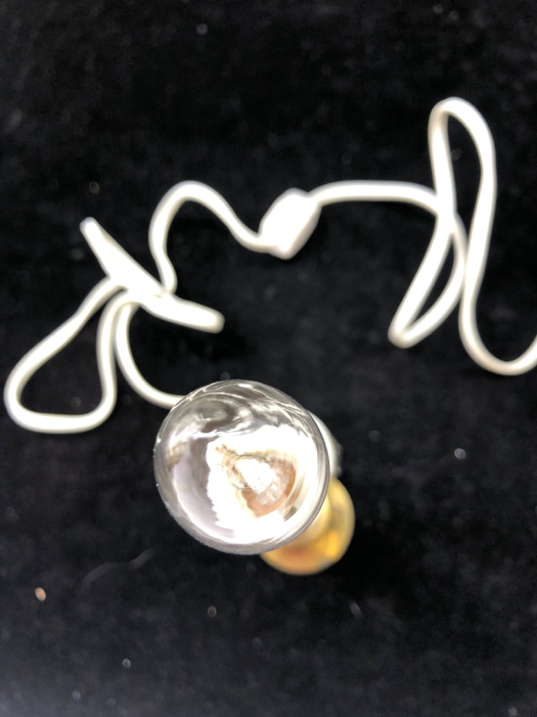 WHITE PLUG IN WINDOW CANDLE.