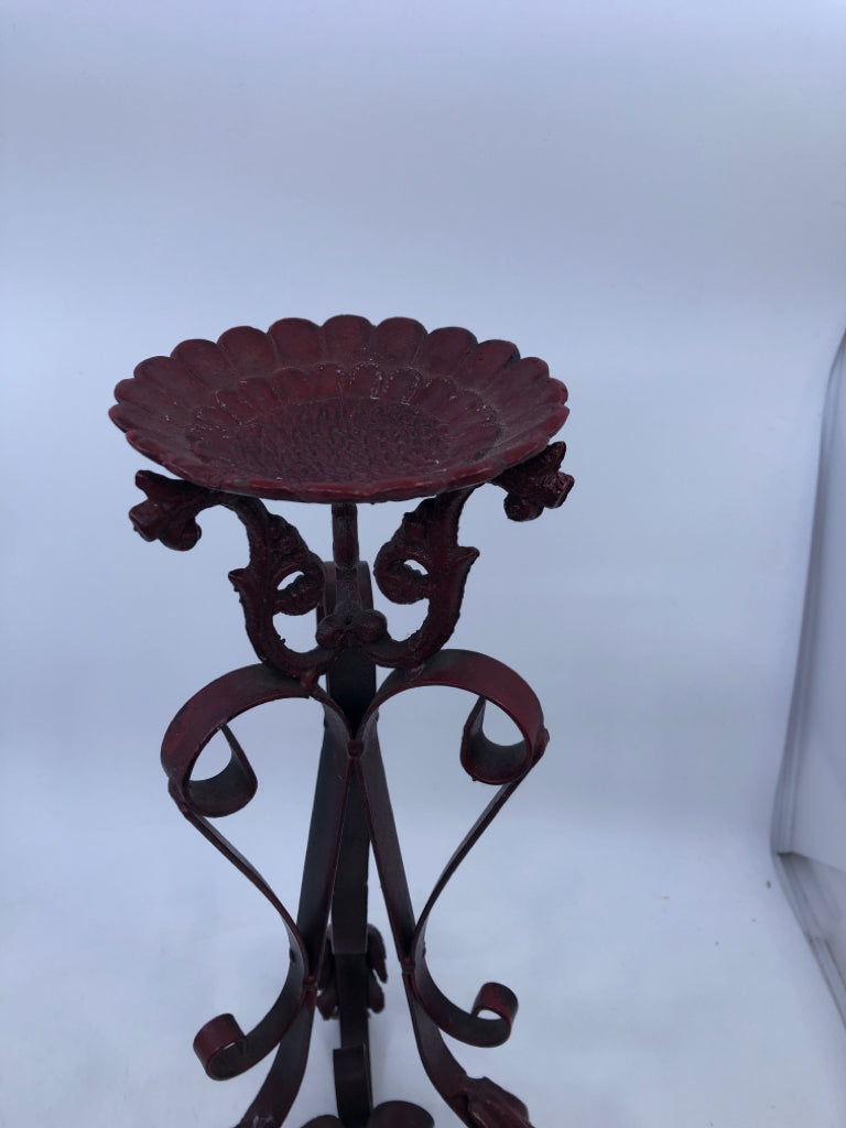 RED IRON SCROLL PILLAR CANDLE HOLDER.
