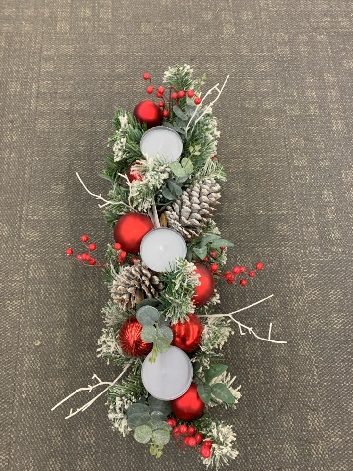 WOODEN BOX CANDLE HOLDER W/ WINTER FOLIAGE AND RED ORNAMENTS.