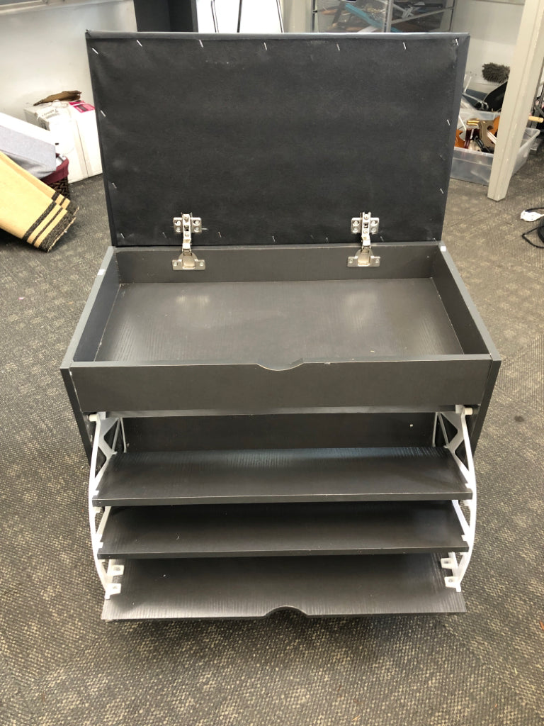 SHOE STORAGE W/PADDED FLIP TOP.