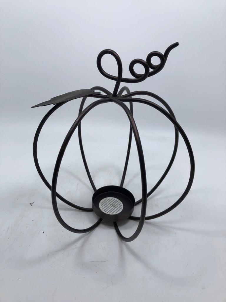 BROWN METAL CAGE PUMPKIN TEA LIGHT HOLDER.