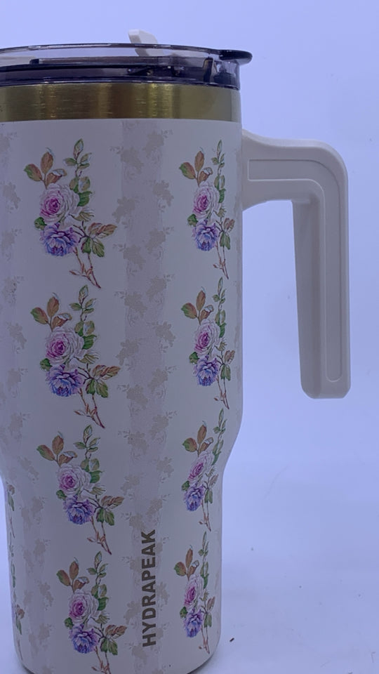 HYDRAPEAK WATER BOTTLE CREAM W/ PINK+PURPLE FLOWERS.