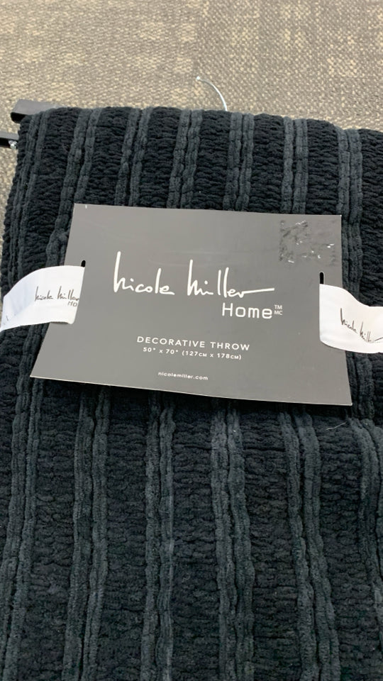 NWT NICOLE MILLER BLACK DECORATIVE THROW.