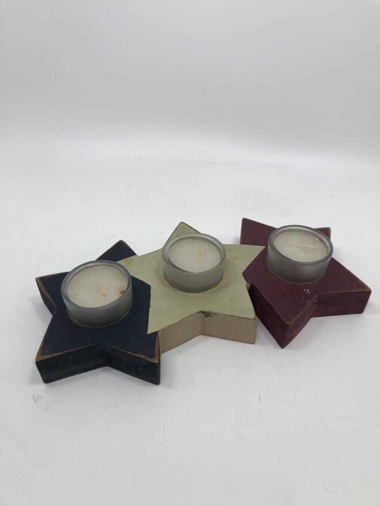 WOOD RED WHITE AND BLUE STAR TEALIGHT HOLDER.