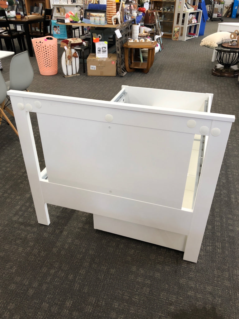 WHITE WOOD TWIN BED W/2 ROLLING DRAWERS.