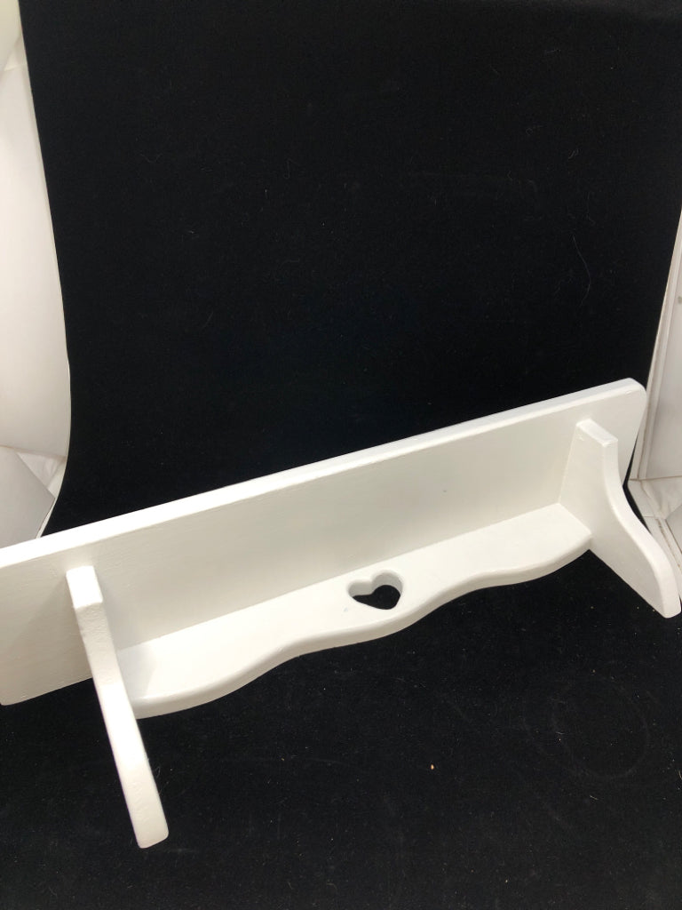 WHITE WALL SHELF W/HEART CUT-OUT.
