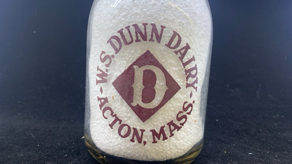 VTG MILK BOTTLE DUNN DAIRY W/ FILLER.