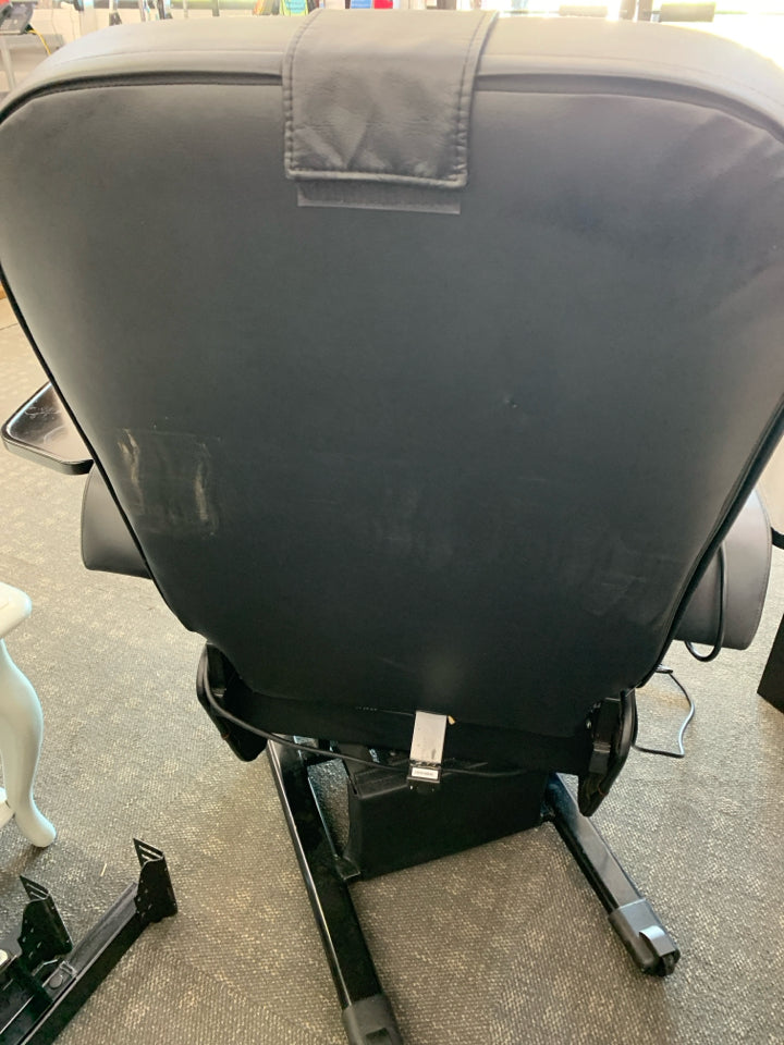 BLACK FAUX LEATHER ELECTRIC RECLINER.