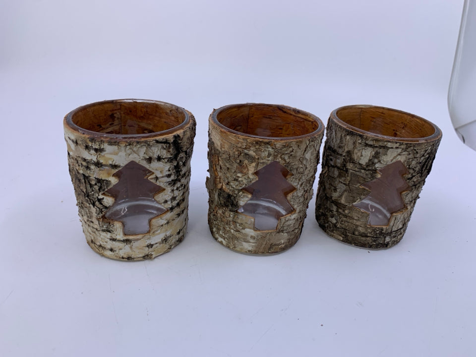 3 TREE BARK COVERED TEA LIGHT HOLDERS W/ TREE CUTOUT.
