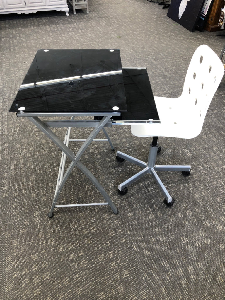 GLASS STUDENT DESK W/WHITE ROLLING CHAIR AND LAP SHELF.