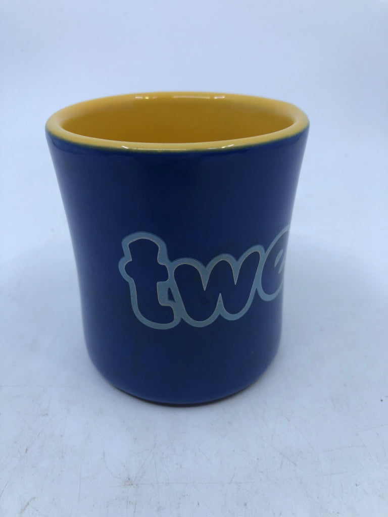 BLUE AND YELLOW TWEETY BIRD MUG.