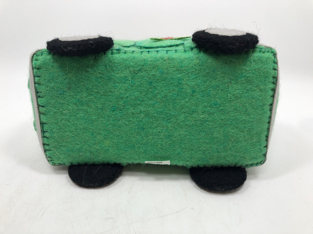 FELT GREEN BUGGY CAR W/ SANTA DRIVING.