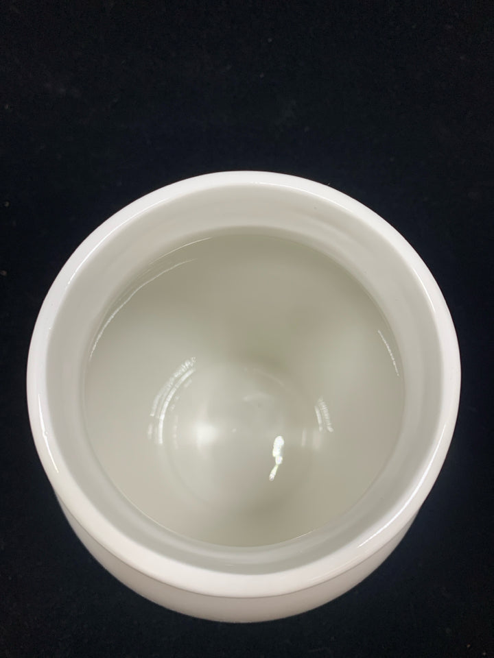 WHITE CERAMIC VASE.