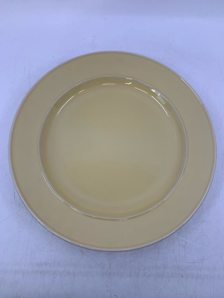 4 PALE YELLOW DINNER PLATES.