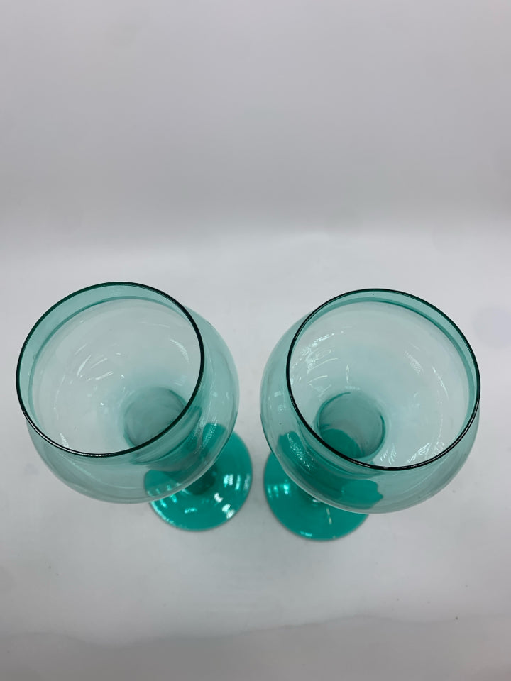 2 GLASS FLOATING CANDLESTICKS.