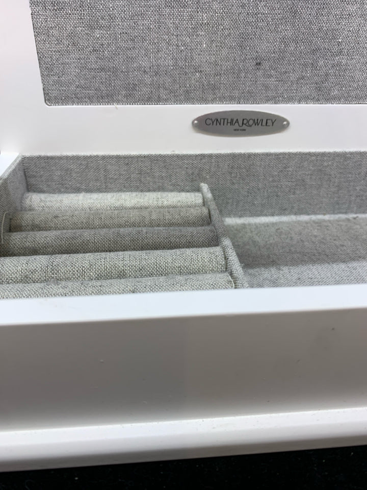 WHITE/GRAY JEWELRY STAND WITH TWO BARS AND RING HOLDER.