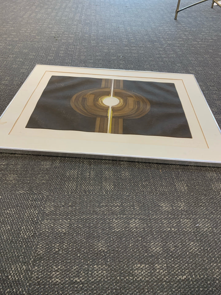 ABSTRACT CIRCLE WALL ART- SIGNED IN SILVER FRAME.