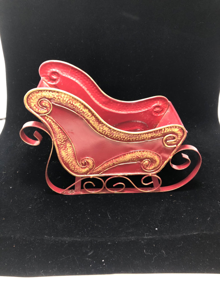 DISTRESSED RED METAL SLEIGH.