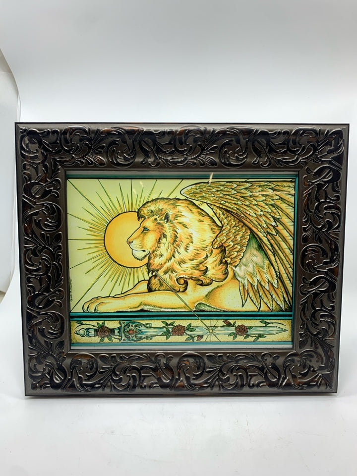 WINGED LION PRINT IN BROWN FRAME.