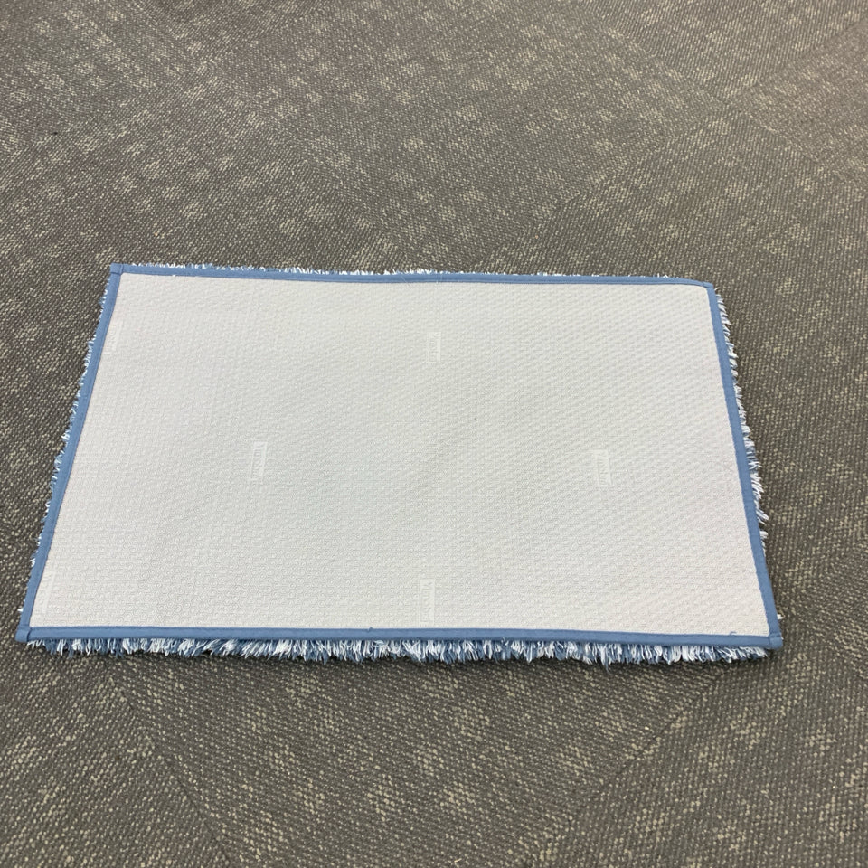 BLUE YIMOBRA FLUFF BATH MAT.