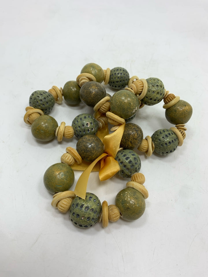 4PK STONE BEAD NAPKIN RINGS.