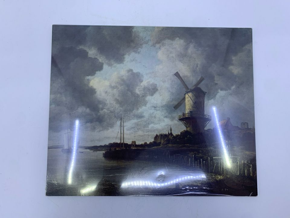 NIP WATER W/ WINDMILL CLOUDY SCENE WALL PLAQUE.