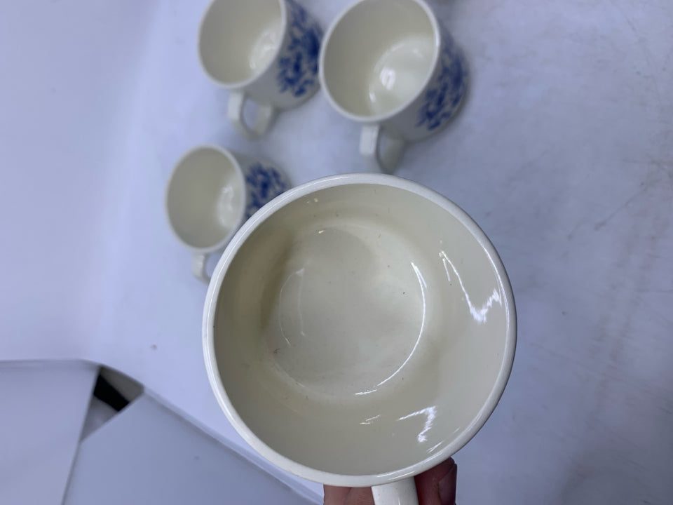 VTG 6 CREAM W/ BLUE FLORAL TEA CUPS.