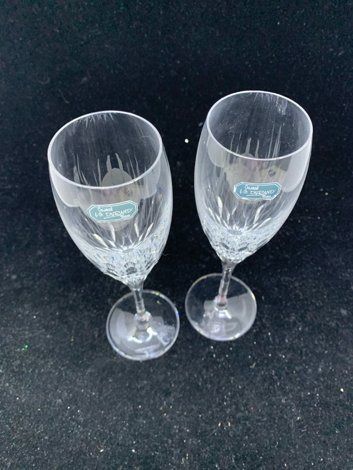 2 CRYSTAL CARVED BOTTOM CHAMPAGNE FLUTES- W STICKER.
