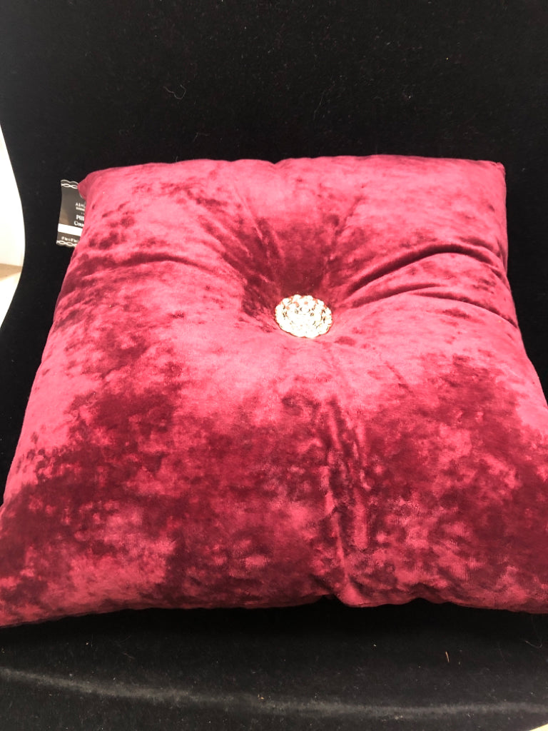 RED VELVET PILLOW W/GOLD+DIAMOND BUTTON.