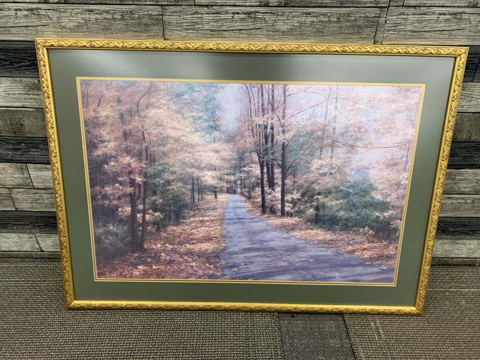 ROAD THROUGH WOODS PRINT IN GOLD FRAME.