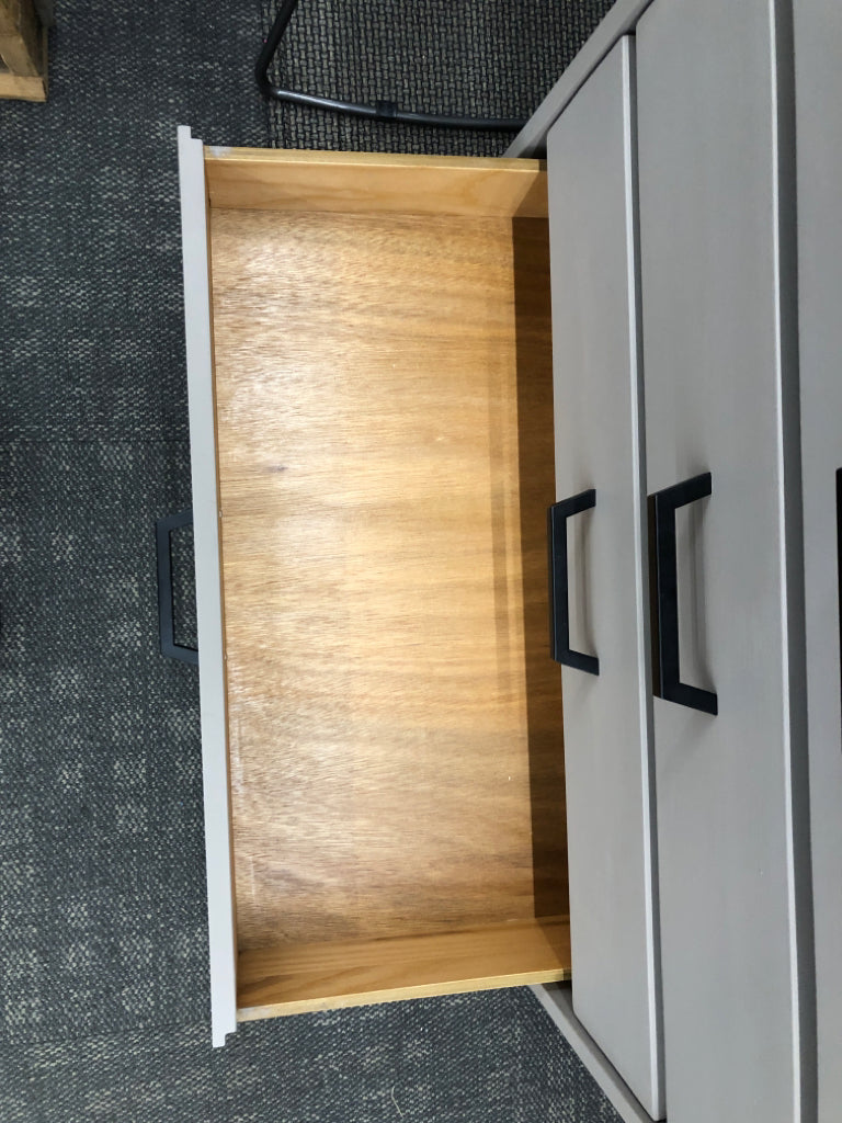 4-DRAWER BEIGE DRESSER.