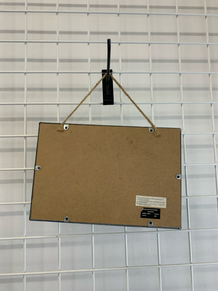 CHALKBOARD AND METAL FRAMED WALL HANGING.