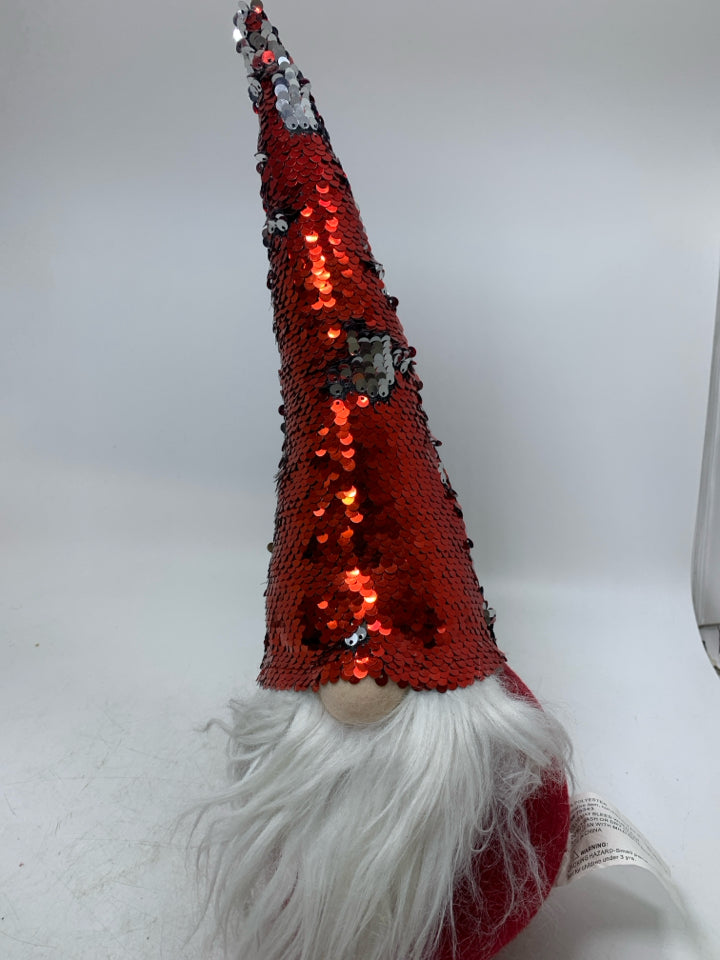 RED PLUSH GNOME W/ RED & SILVER SEQUENCE HAT.