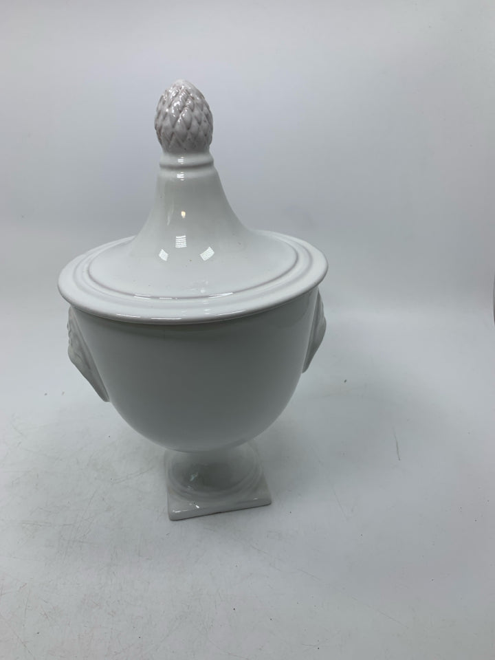 FOOTED URN SHAPED CANISTER W/ POINTED TOP.
