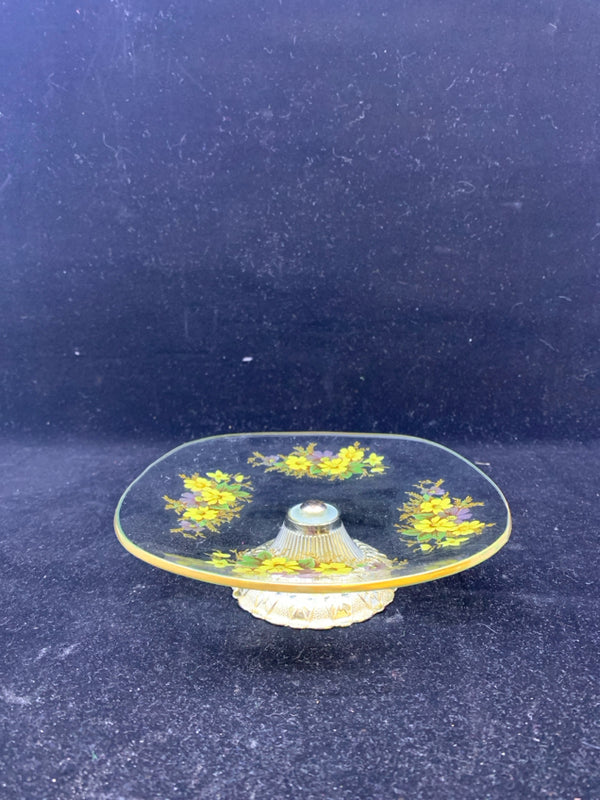 SQUARE YELLOW FLOWERED GLASS SERVING TRAY WITH METAL FOOT.