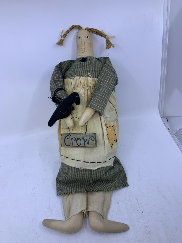 PLUSH WOMAN W/ GREEN DRESS GOLDING CROW SIGN.