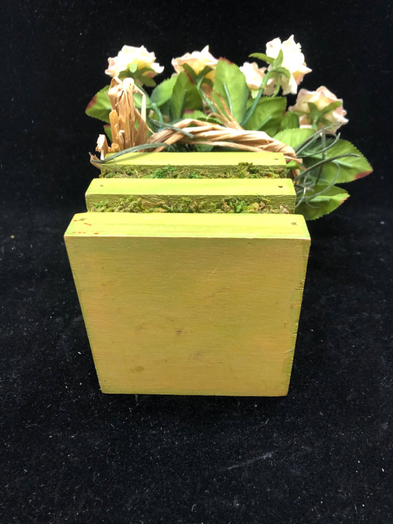 FAUX FLORAL W/GREEN WOODEN BASE.